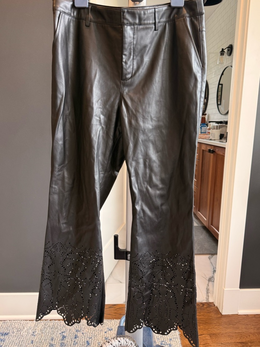 Anthropologie Black Faux Leather Pants with Laser-Cut Hem